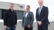 Economy Minister Gordon Lyons (right) with Dungeons and Dragons producer Jeremy Latcham (left) and NI Screen CEO Richard Williams