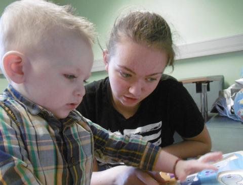 Annie Doherty helping out with Toybox while studying for her GCSEs