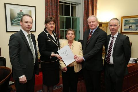 Eileen Evason (centre) with members of her team that produced the WR mitigation report as well as the First and deputy First Minister