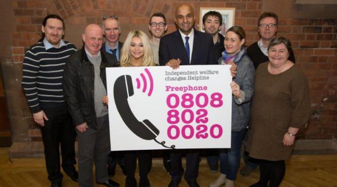 Kevin Higgins (third from left) at the launch of Advice NI's Universal Credit helpline